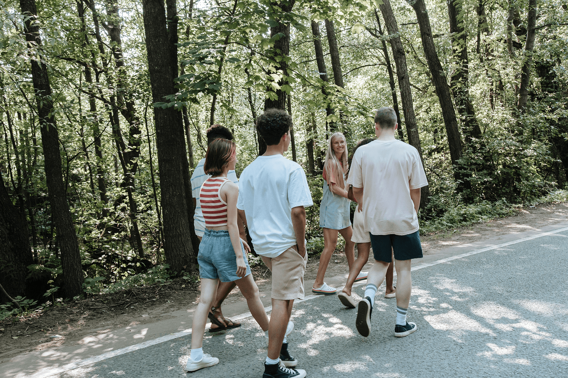 Group of friends walking side-by-side in Istanbul